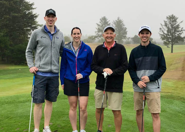 Picture with my brother-in-law, sister, and father while golfing - one of my favorite hobbies