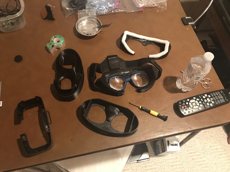Photo of a custom-designed, 3D printed, virtual reality headset in the process of assembly
